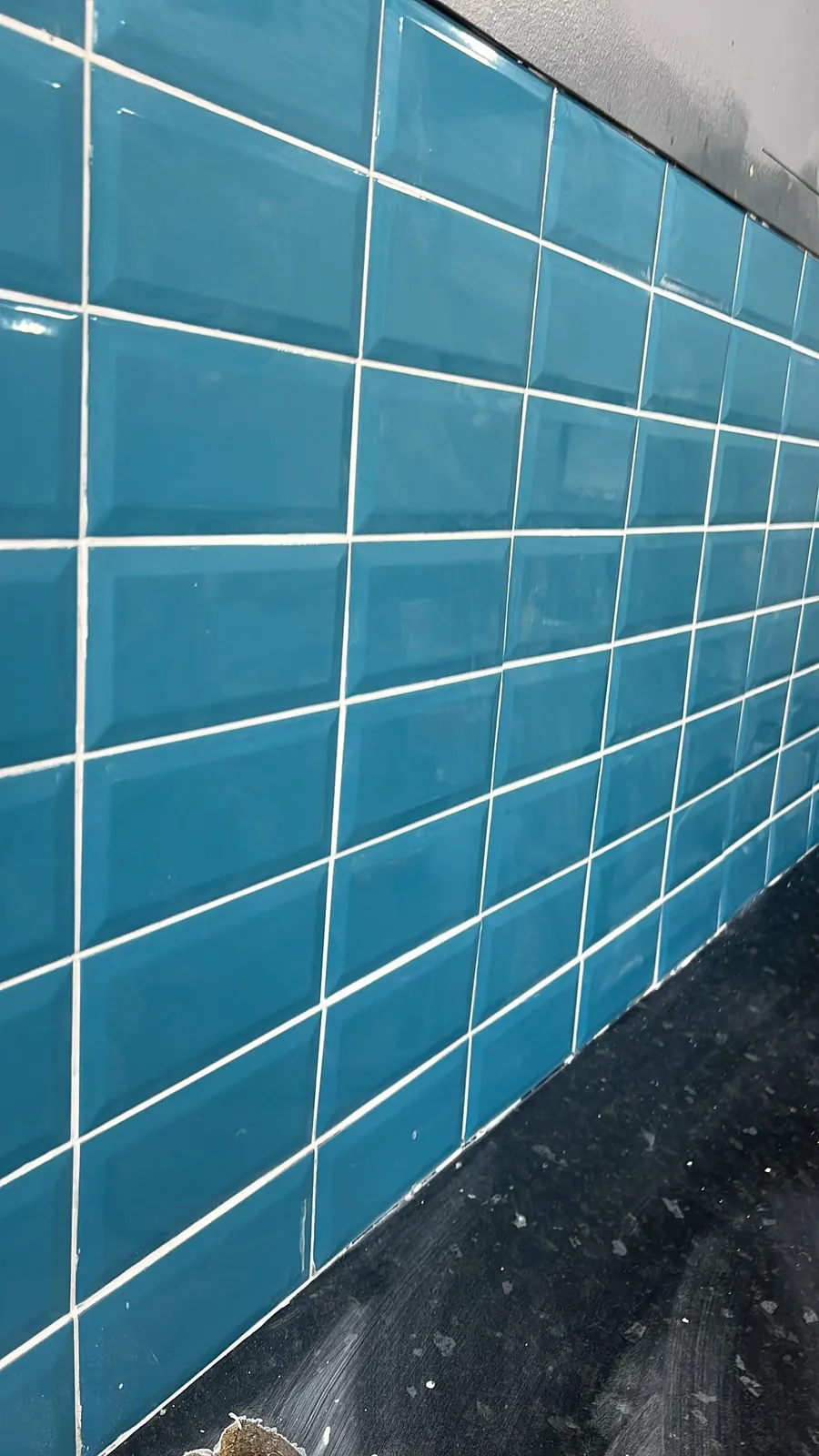 Close-up detail of teal metro tile splashback, Brentwood
